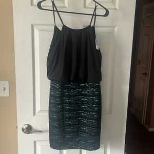 Junior’s New With Tags large sleeveless dress with lace overlay on top of aqua